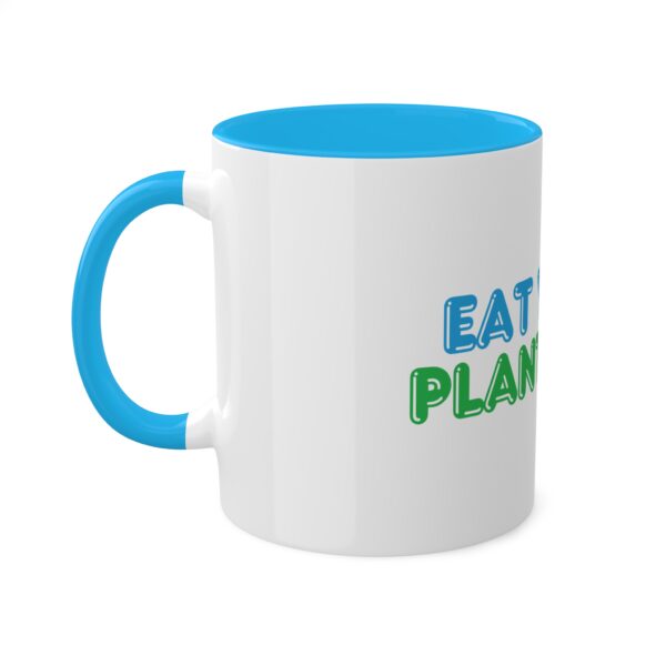 a white and blue mug with Eat Your Plants Off®